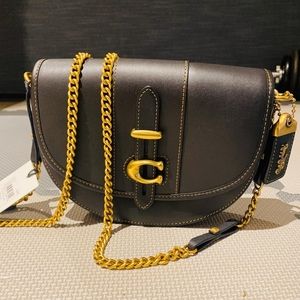 Coach brand new saddle bag